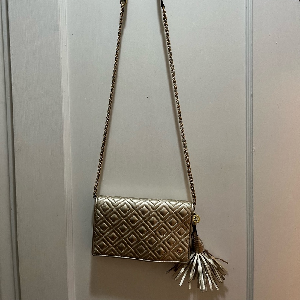 Gold Tory Burch cross body purse